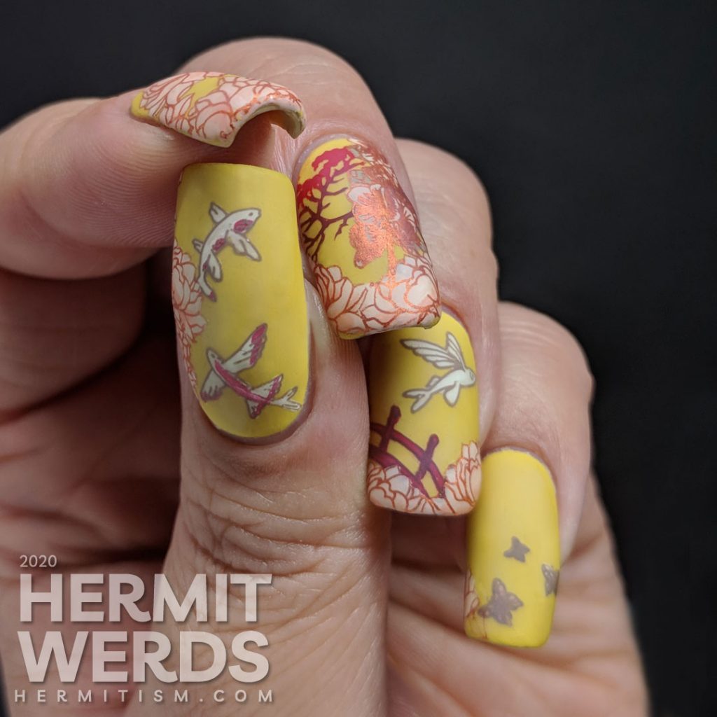 Ornate orientalesque nail art on a mustard background with a bridge, flying fish, gardenias, and a Japanese maple.