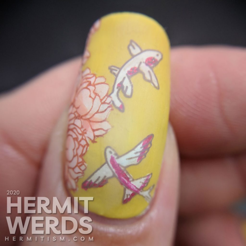 Ornate orientalesque nail art on a mustard background with a bridge, flying fish, gardenias, and a Japanese maple.