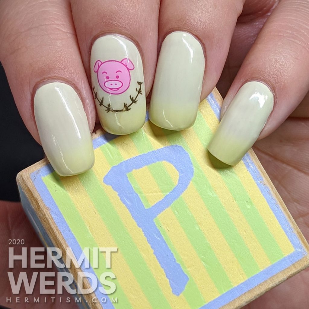 Green thermal nail art with cute pigs stamped on top.