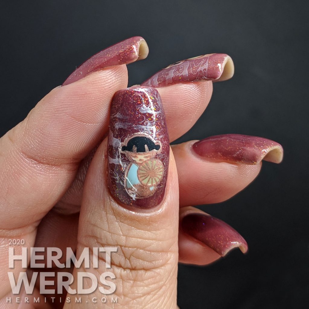 Warm rosy-brown nail art with little chibi Japanese girls in kimonos.