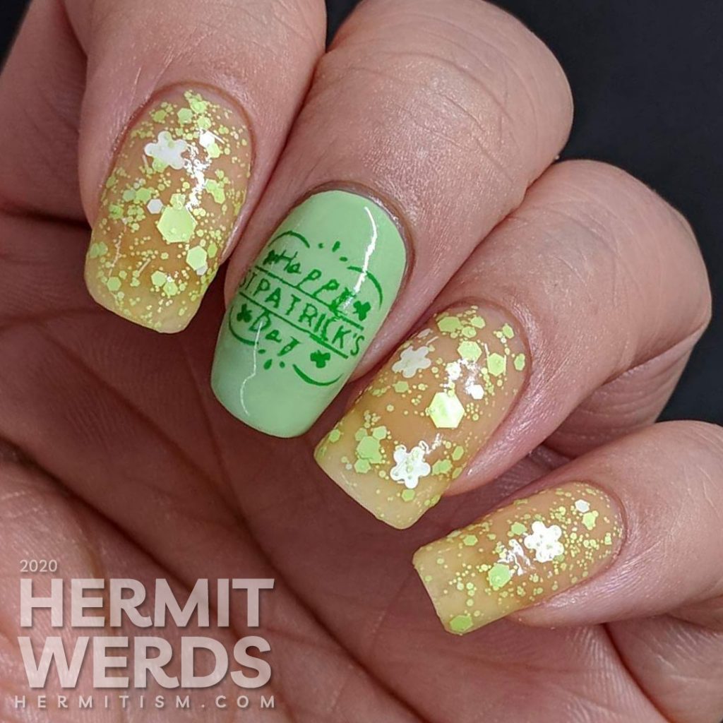 Seemingly green St Patrick's Day nail art with clover which has a pink thermal polish secret.