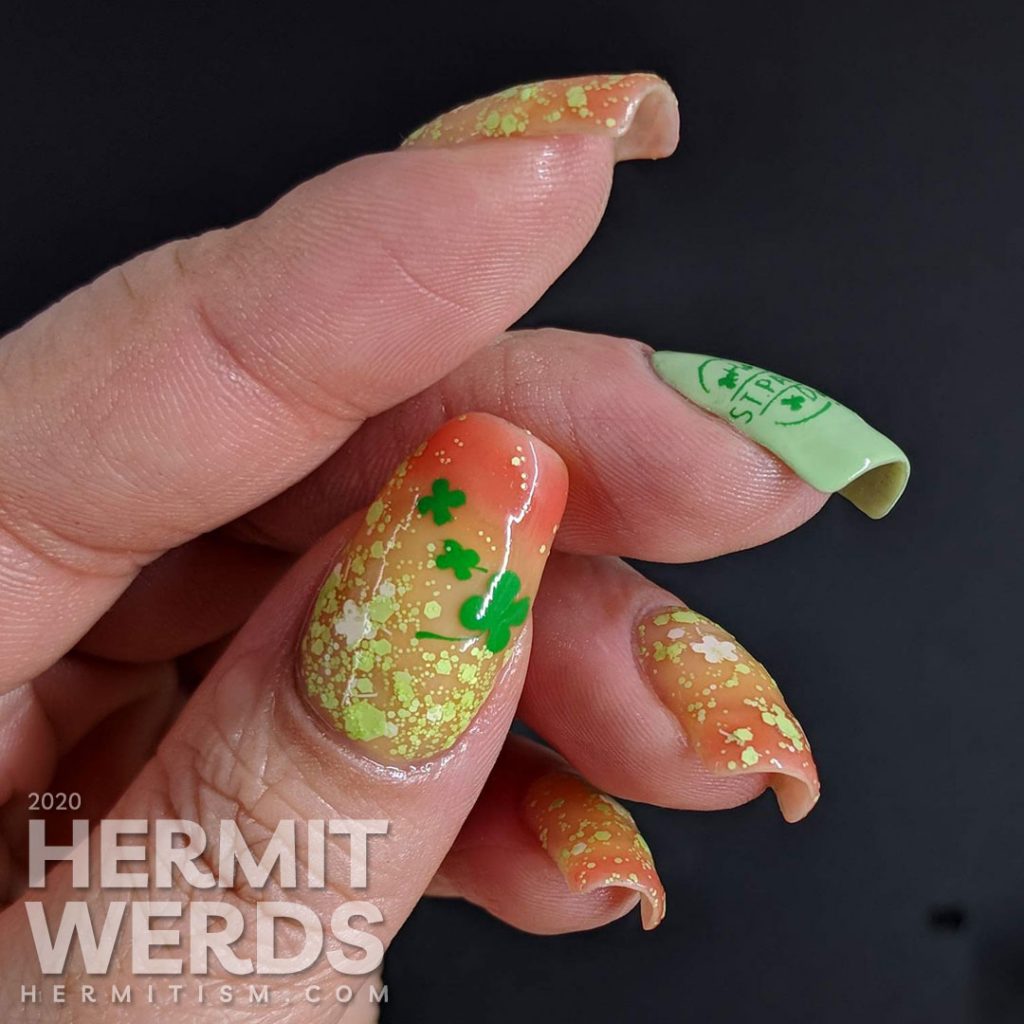 Seemingly green St Patrick's Day nail art with clover which has a pink thermal polish secret.