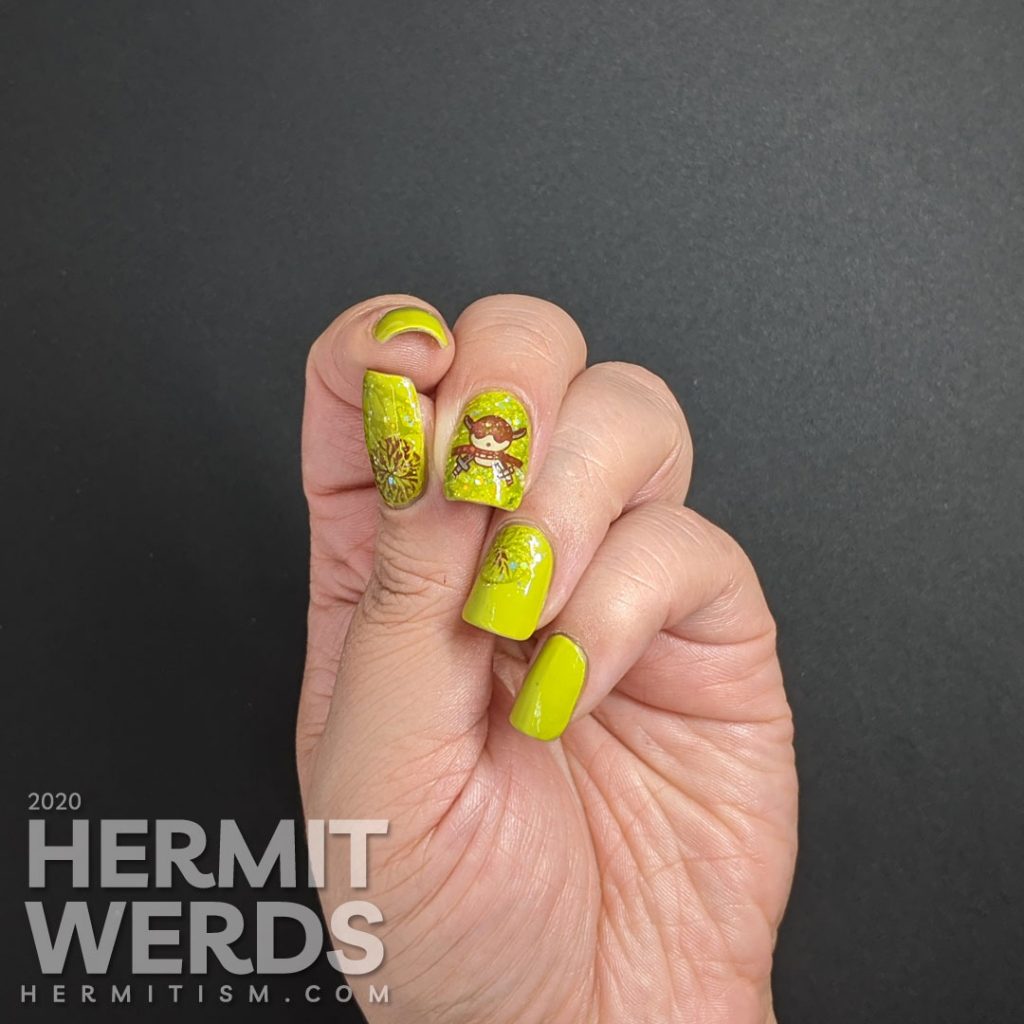 Bright celery green nail art with a skull and crossed swords stamped on top.