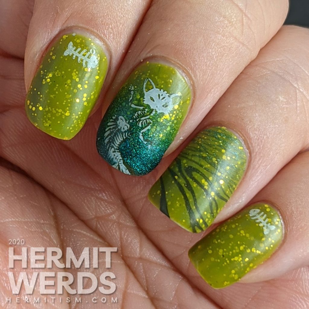 Pugly green nail art with skeletal mermaid cat double stamping decals and a teal to green gradient.