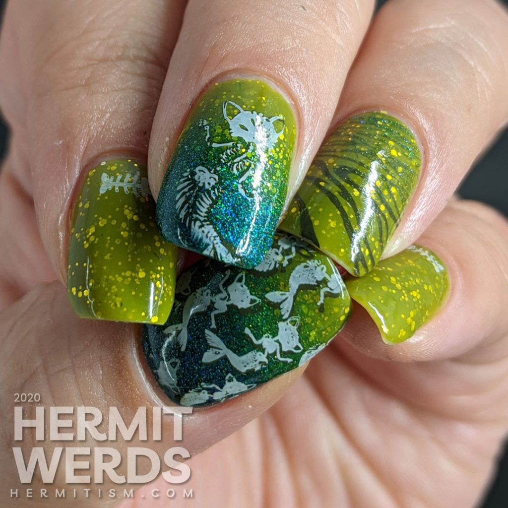 Pugly green nail art with skeletal mermaid cat double stamping decals and a teal to green gradient.