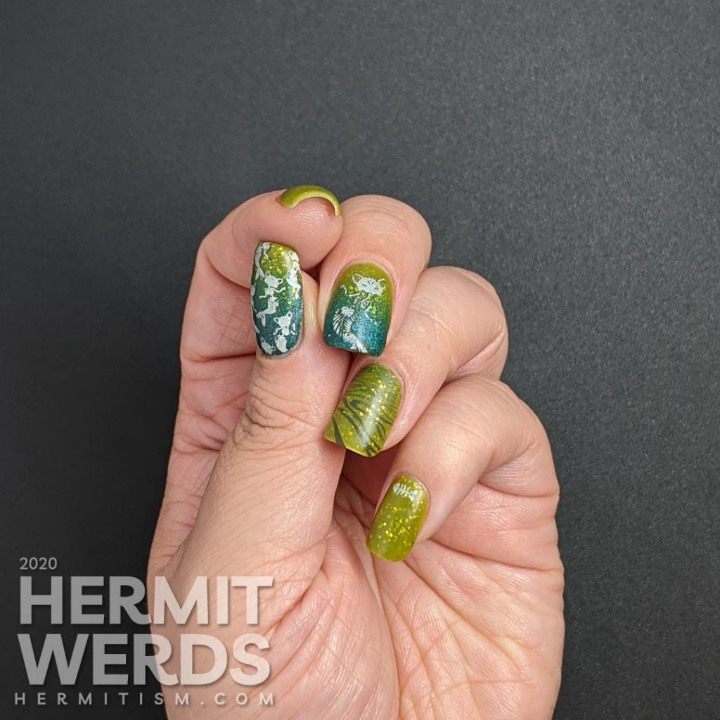 Pugly green nail art with skeletal mermaid cat double stamping decals and a teal to green gradient.