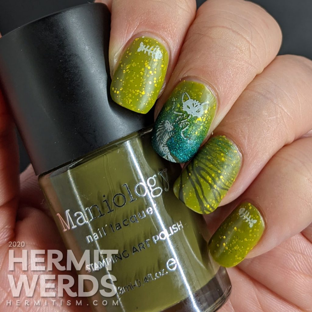 Pugly green nail art with skeletal mermaid cat double stamping decals and a teal to green gradient.