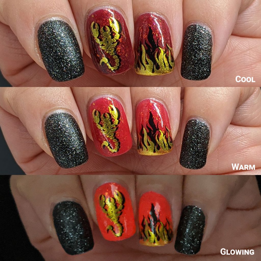 A glow in the dark fire-y thermal red and black nail art with double stamped scorpion and flames and edgy black textured polish accent nails.