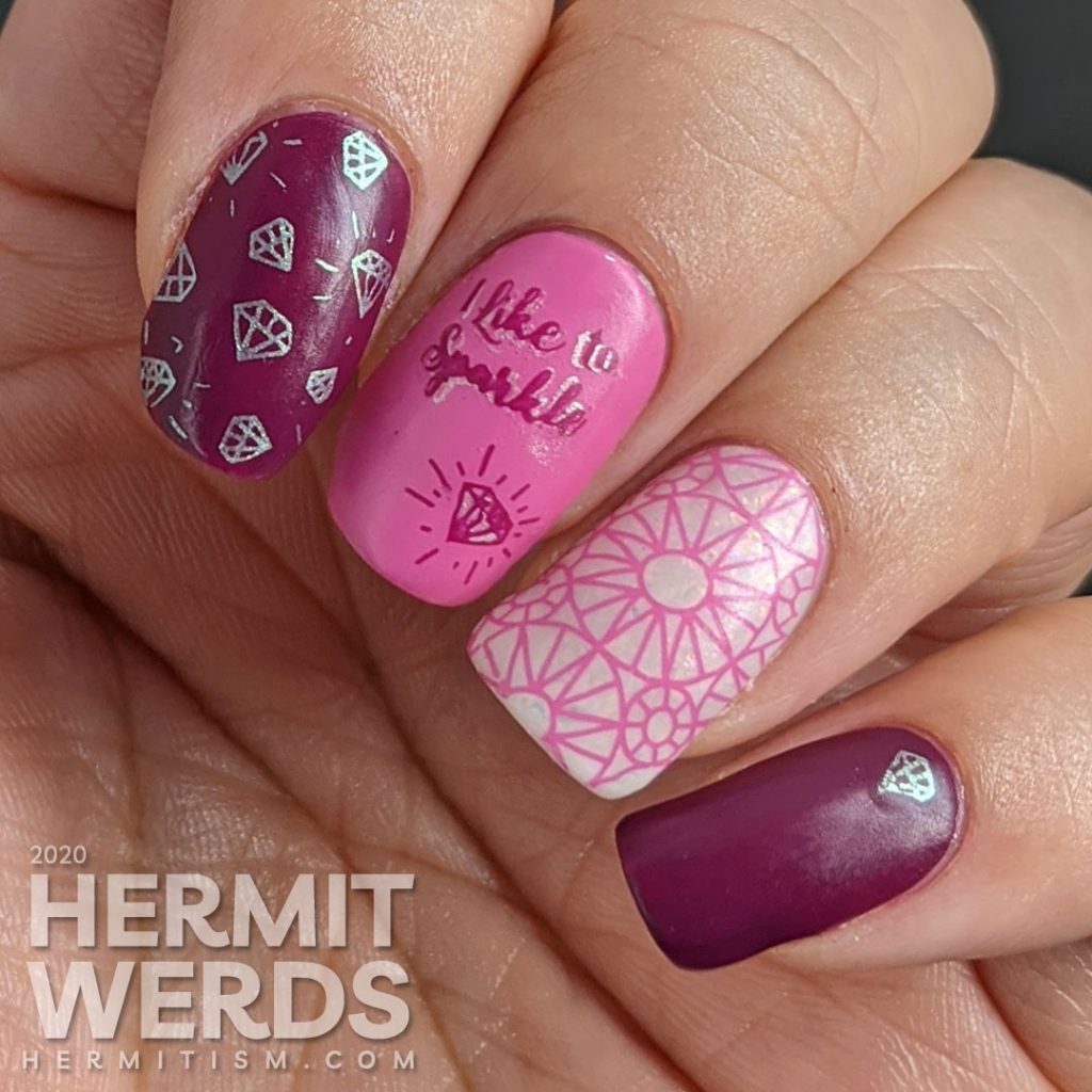 Diamond themed nail art in pinks and purples with an iridescent white crelly accent nail that is covered in faceted gem stamping. "I like to sparkle."