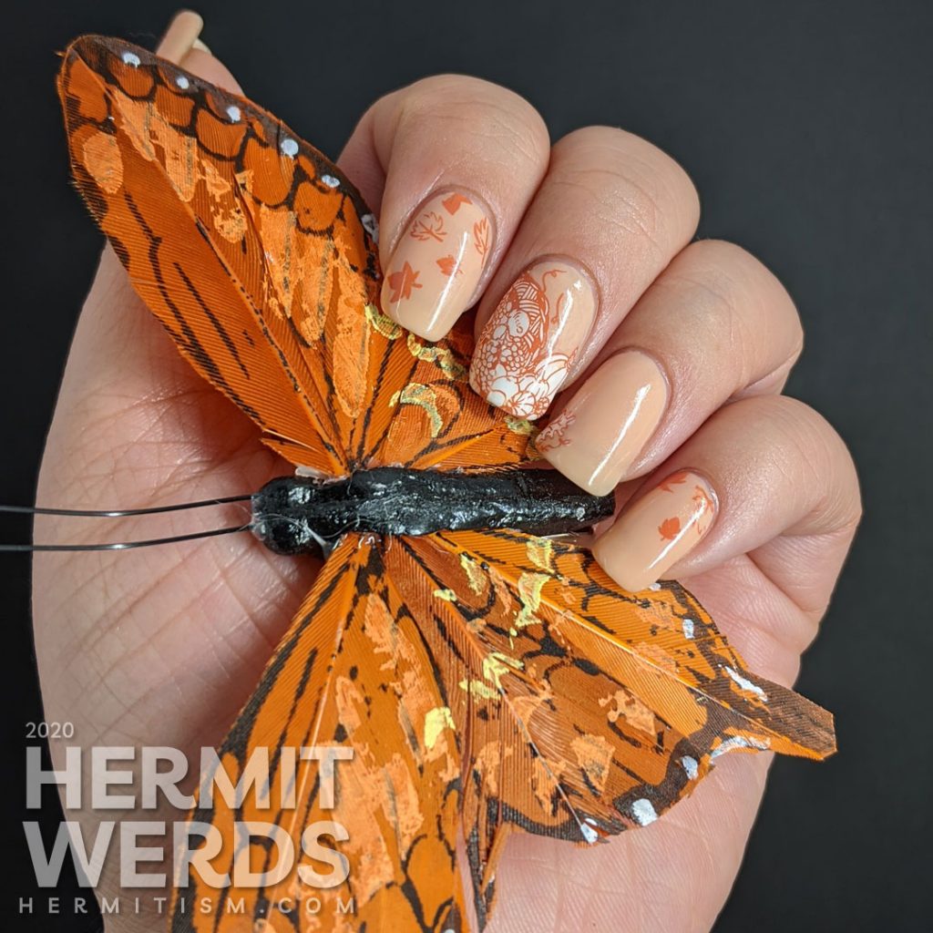 A simple fall nail art with stampings of leaves, pumpkins, and other harvest-related items on an apricot jelly polish background.