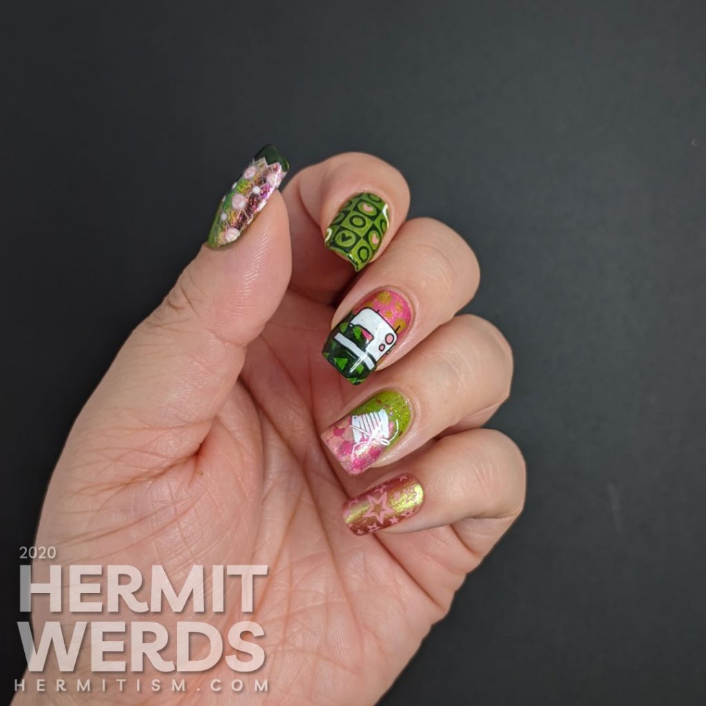 Quilting themed nail art with decals of sewing machine, bobbins, cloth swatches, and patterns to make a beautiful pink and green quilt.