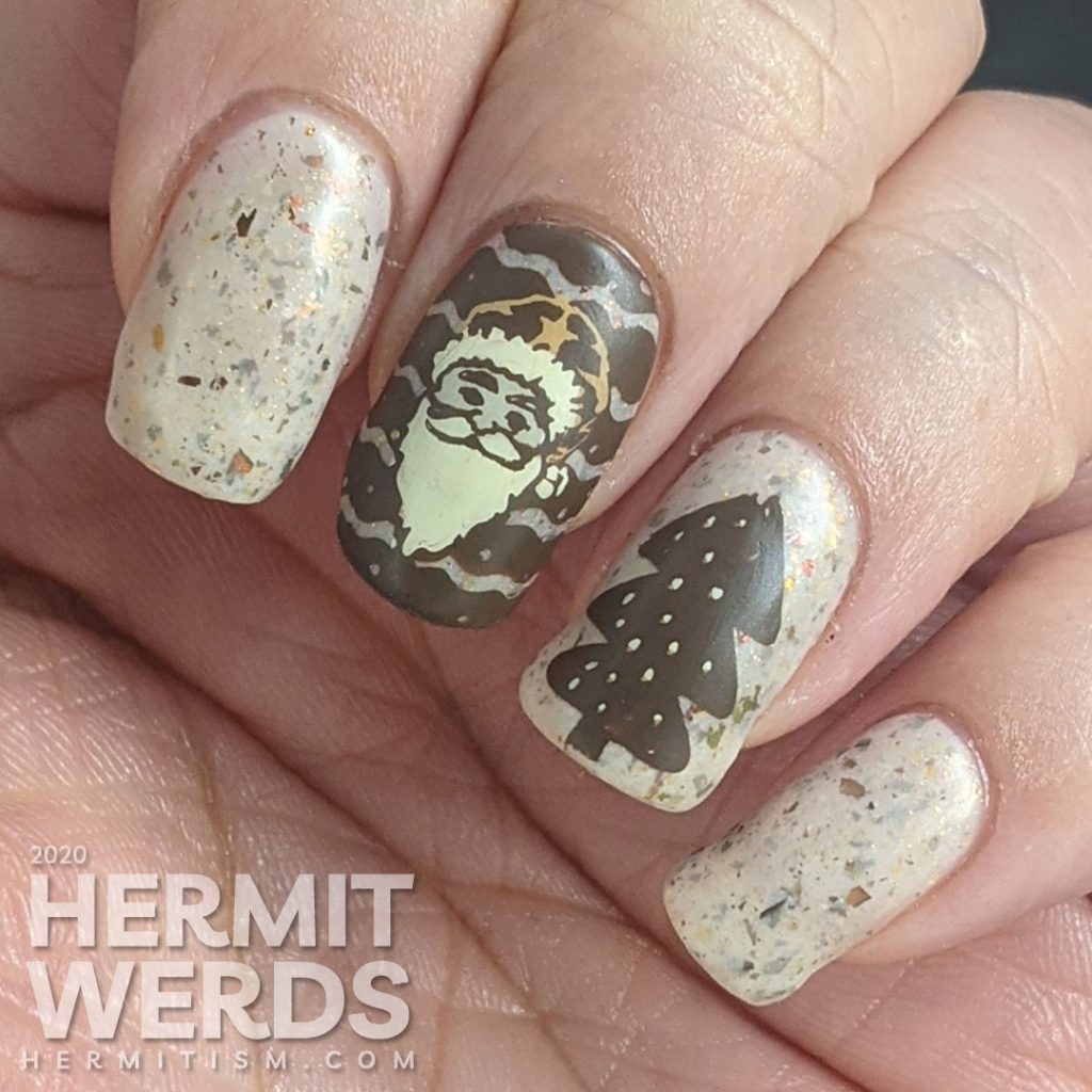 Nail art with Christmas imagery: Santa, Christmas tree, and Santa's sleigh taking off in a shower of stars on a light tan flakie-filled base.