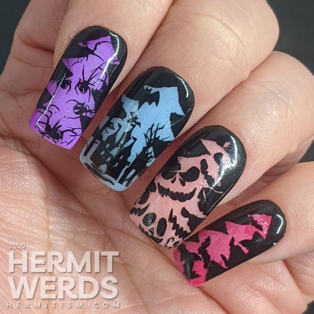 A rainbow glow in the dark mani of silhouetted Halloween images of bats, jack-o-lanterns, haunted castle, spiders, and eyeball candy glowing out from a Christmas tree frame.