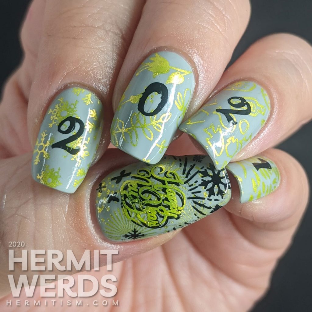 A New Years mani with a grey background, bright green stamping of winter/spring/summer/fall seasons and "2021" on top.