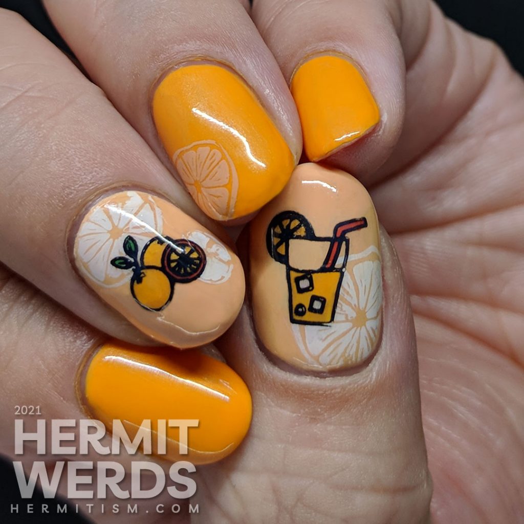 Fruit-themed bright orange nail art with orange slice and orange stamping decals on top.