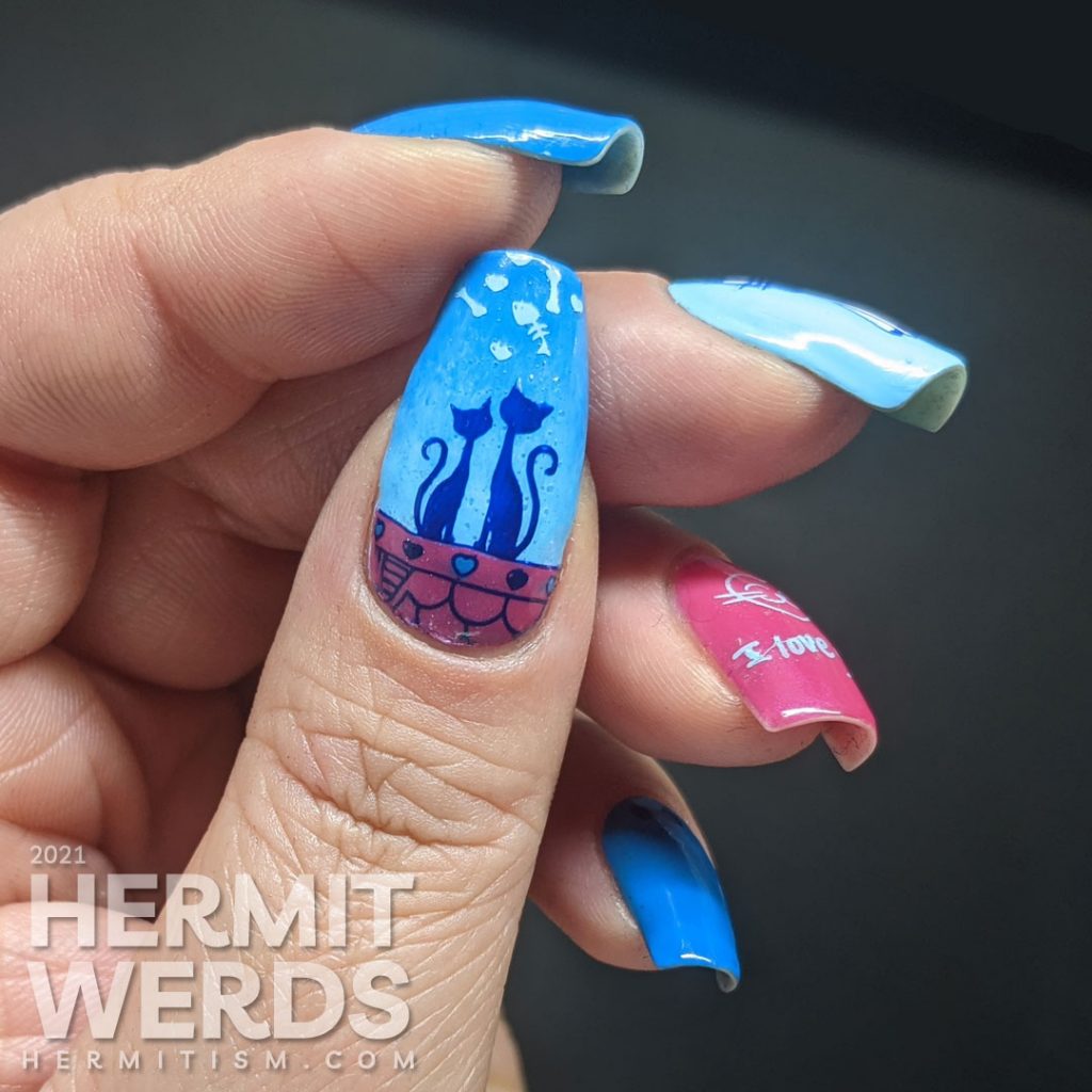 Blue and pink nail art of a gentleman cat dressing up in a bow tie to woo his lady in the city using stamping decals.