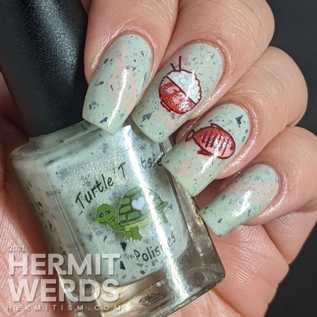 A pale mint and chocolate chip nail polish base with rice, fish, and miso soup stamping decals as a Japanese breakfast.