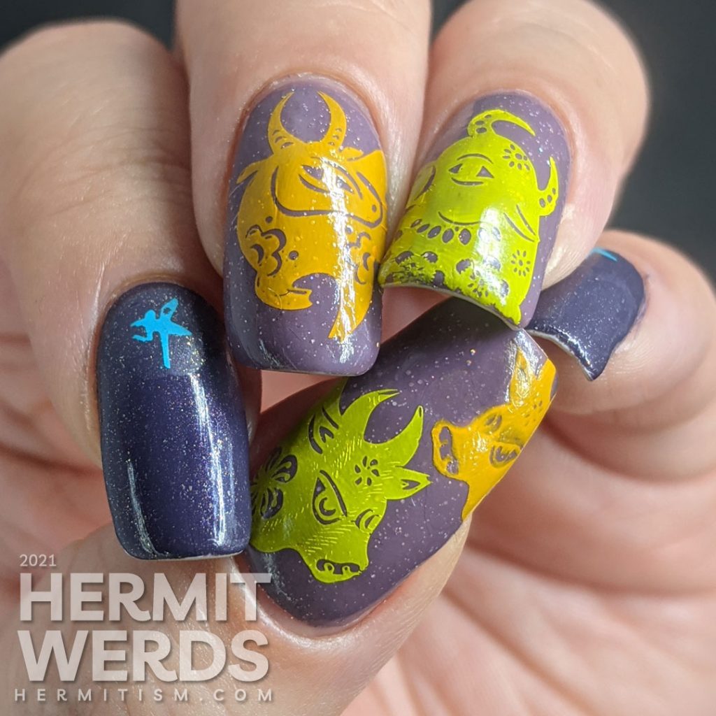 The failed first version of Year of the Ox nails in the year's lucky colors (yellow, purple, and blue).