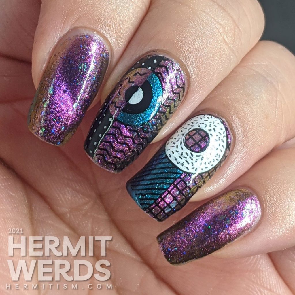 A gorgeous multichrome indie magnetic polish with abstract donut shapes and very 80s patterns stamped on top.