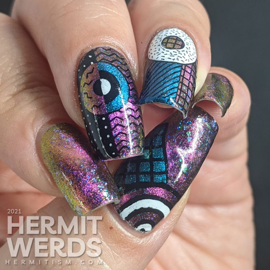 A gorgeous multichrome magnetic polish with abstract donut shapes and very 80s patterns stamped on top.