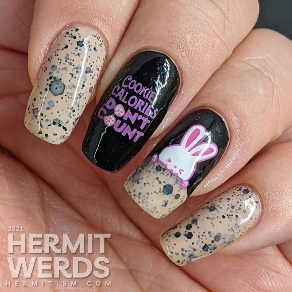 A sweet chocolate chip cookie mani with Sinful Colors' "Cookies & Cream" scented polish, a cute bunny stamping decal and "cookie calories don't count" sentiment.