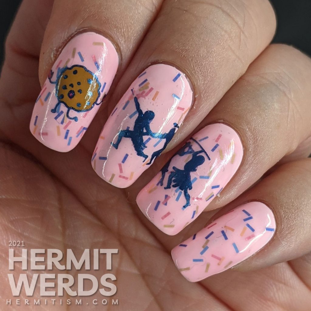 A sweet pink nail art using Sinful Colors' "Donut Even" with bar glitter sprinkles and a donut stamping decal running away from a group of hunters.