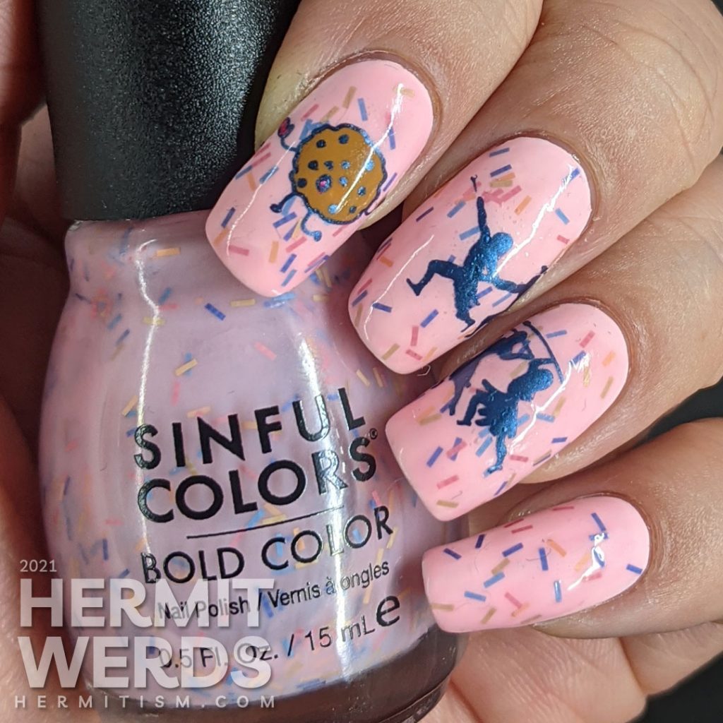 A sweet pink nail art using Sinful Colors' "Donut Even" with bar glitter sprinkles and a donut stamping decal running away from a group of hunters.