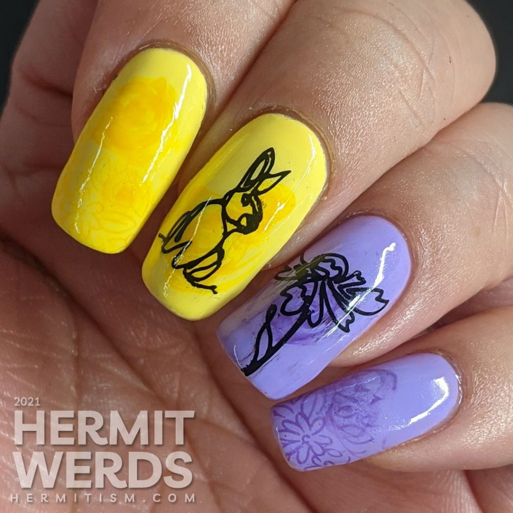 Light purple and yellow nail art with swirls of darker polish highlighting freeline spring images of a bunny and flowers.