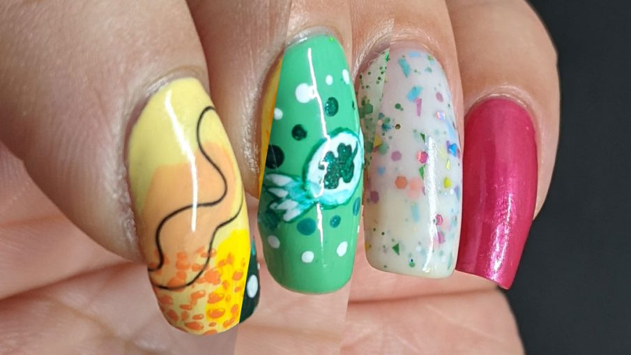 Three sweet nail art looks: yellow and orange heart balloons, green clover candies, and sweet blue and pink lollipops.