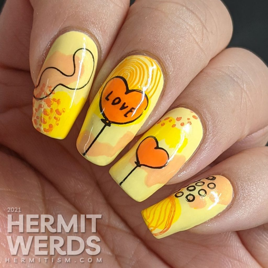 A bright yellow and orange mani with modern abstract shapes and heart balloon stamping decals. Unicorn included.