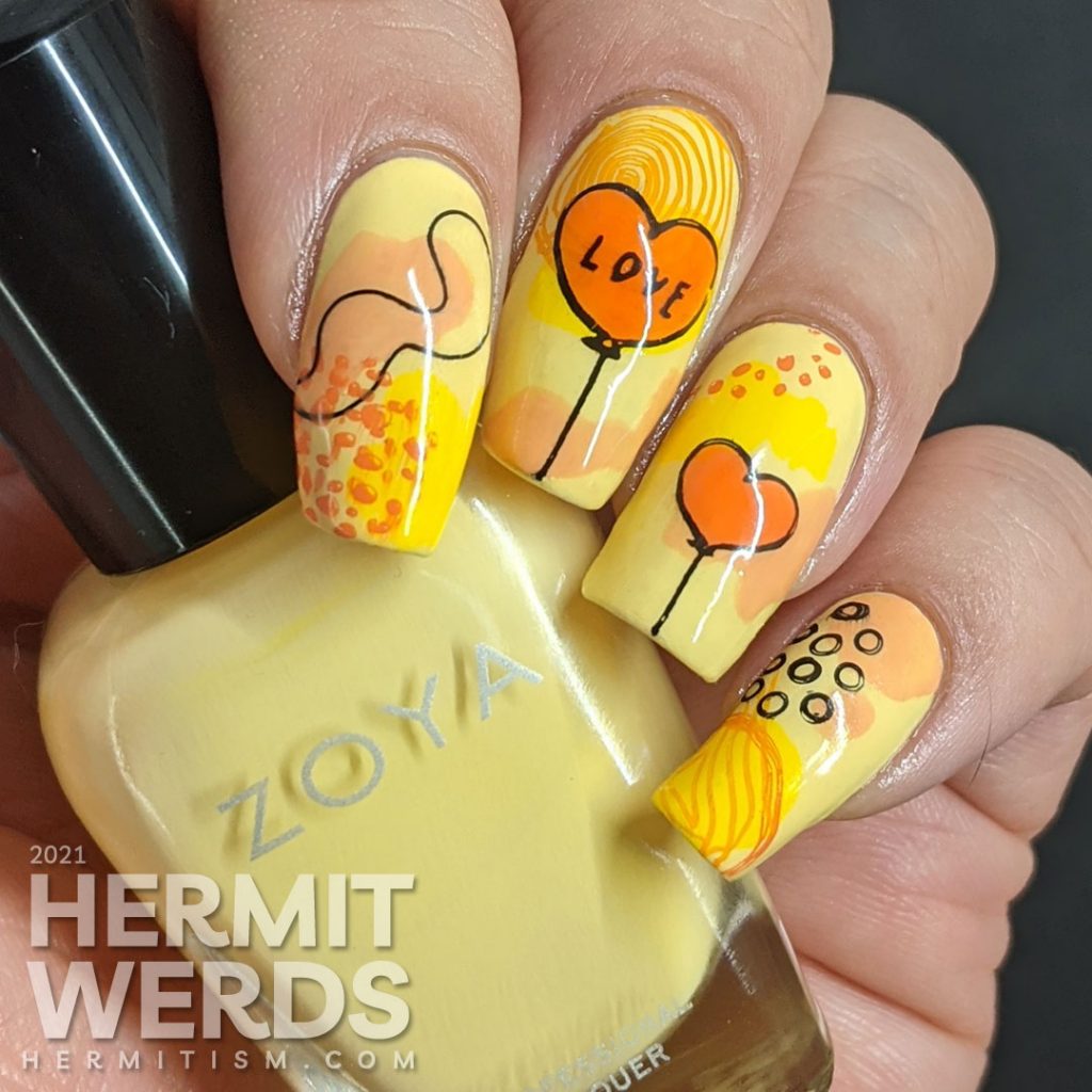 A bright yellow and orange mani with modern abstract shapes and heart balloon stamping decals. Unicorn included.