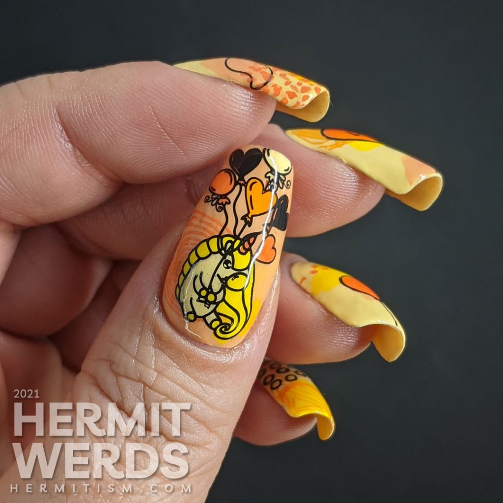 A bright yellow and orange mani with modern abstract shapes and heart balloon stamping decals. Unicorn included.