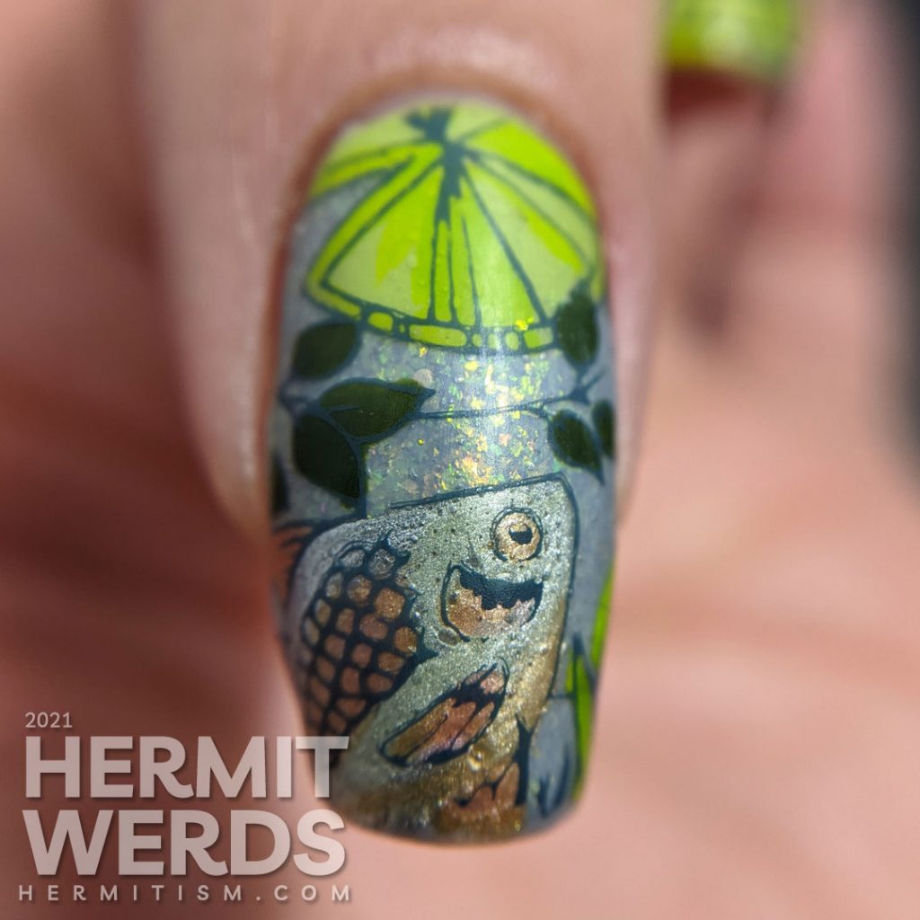 A soft blue-green mani of pond life, mostly frogs and one fish stamping decal with lily pads and other pond greenery.