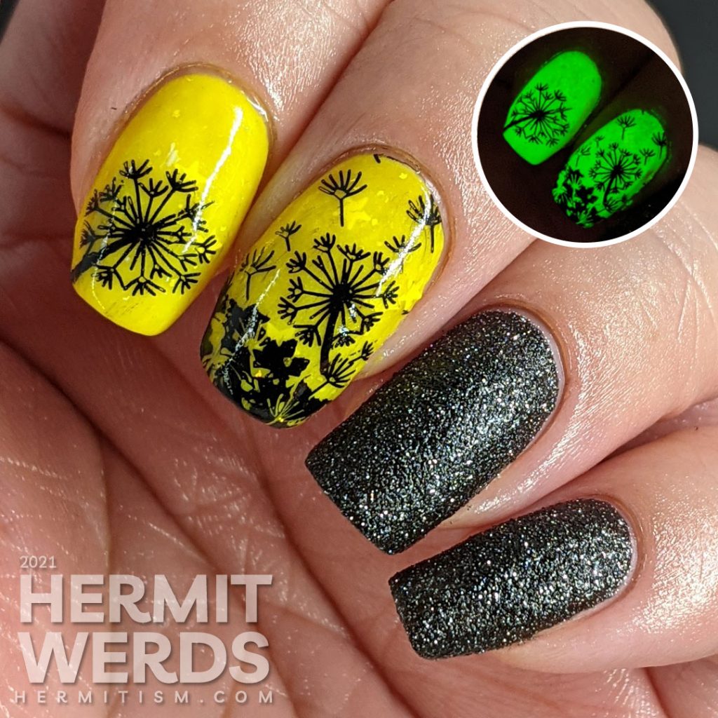 A neon yellow crelly and black texture polish manicure with negative space black dandelions stamped on top. Glows in the dark.