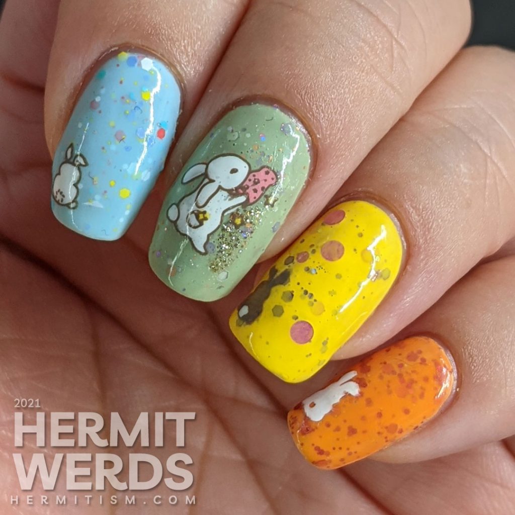 A pastel Easter crelly skittle nail design with a magical bunny, cute bunny butts, and a bunny in a jar for next year.