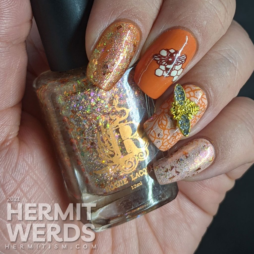 An orange and light pink mani with a super flakie rose gold topper, gold bee nail charm, and simple bee mosaic stamping decals.