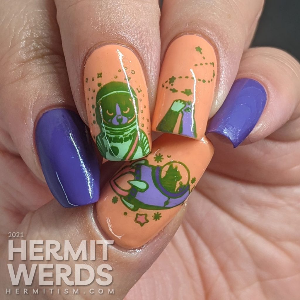 A purple peach and green (secondary color scheme) nail art with astronaut kitties and cats high fiving because they conquered space.