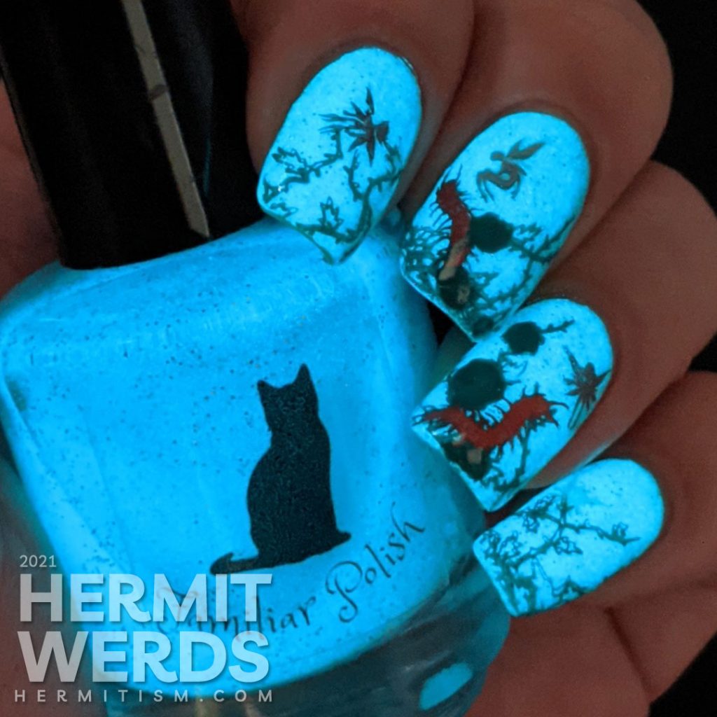 Thorny teal rose vines against a glow in the dark sparkly teal base with fairy and centipede reverse stamping decals.