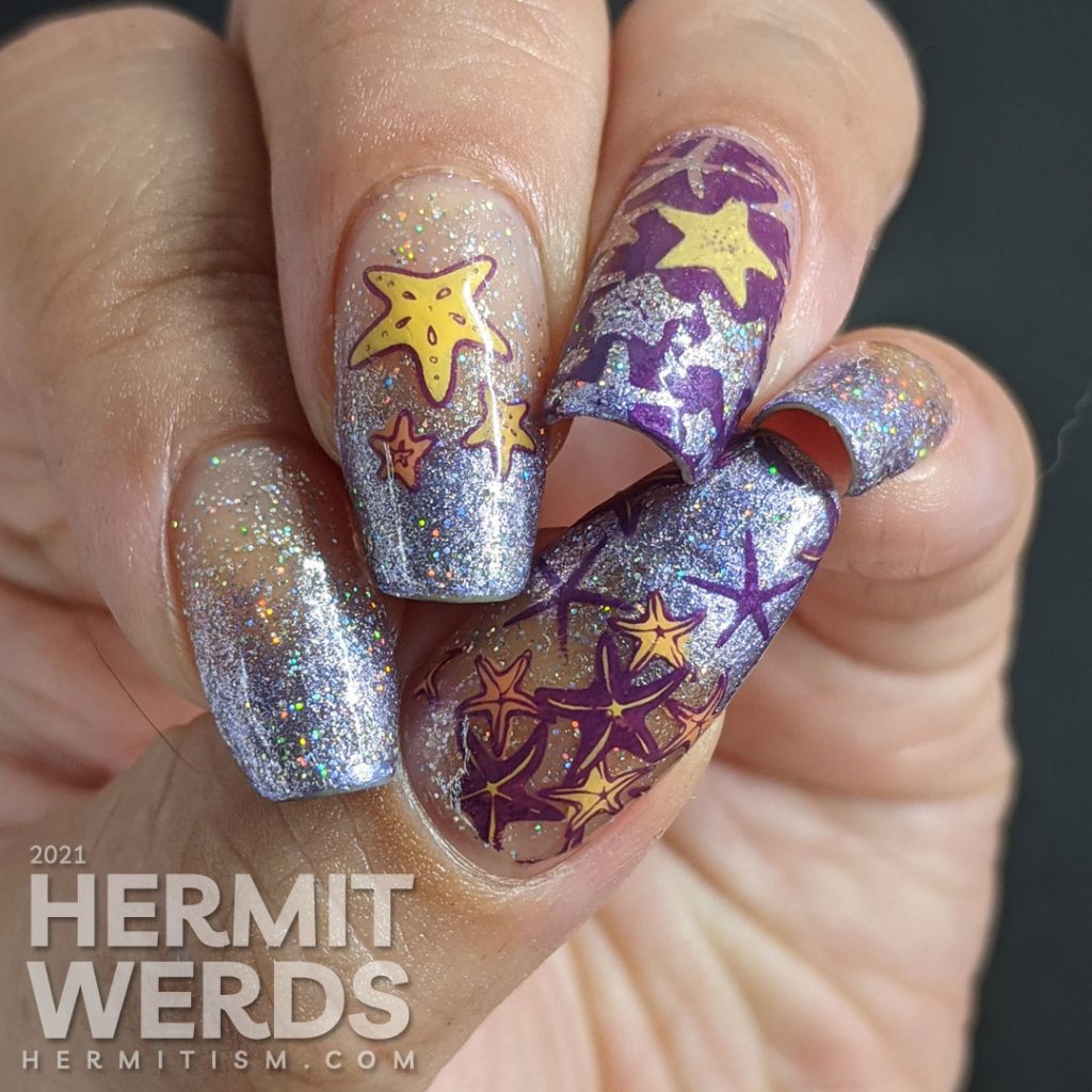 A purple baby boomer French tip nail art with a solar holographic glitter polish and starfish stamping decals on top.