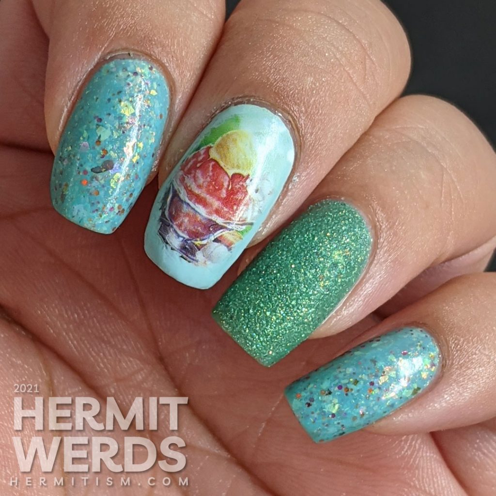 Teal/blue-green nail polishes with soft watercolor-like water decals of yummy ice cream dishes (sundae and milkshake) on top.