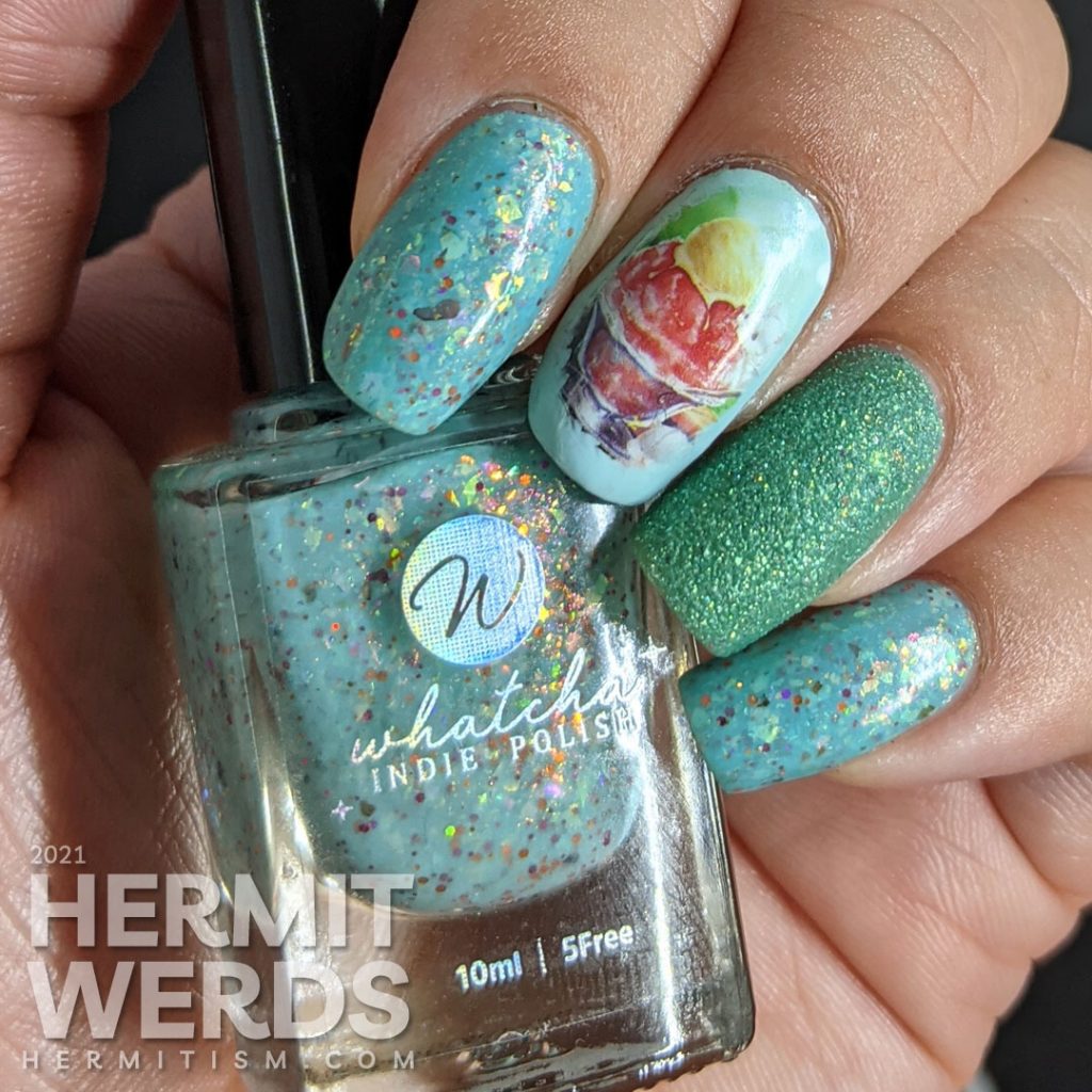 Teal/blue-green nail polishes with soft watercolor-like water decals of yummy ice cream dishes (sundae and milkshake) on top.