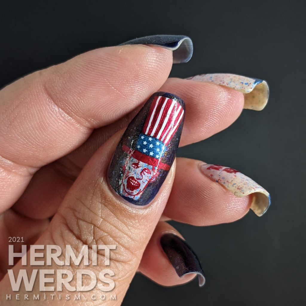 Patriotic nail art for the United States of Zombies with a red white and blue crelly and zombie stamping decals.