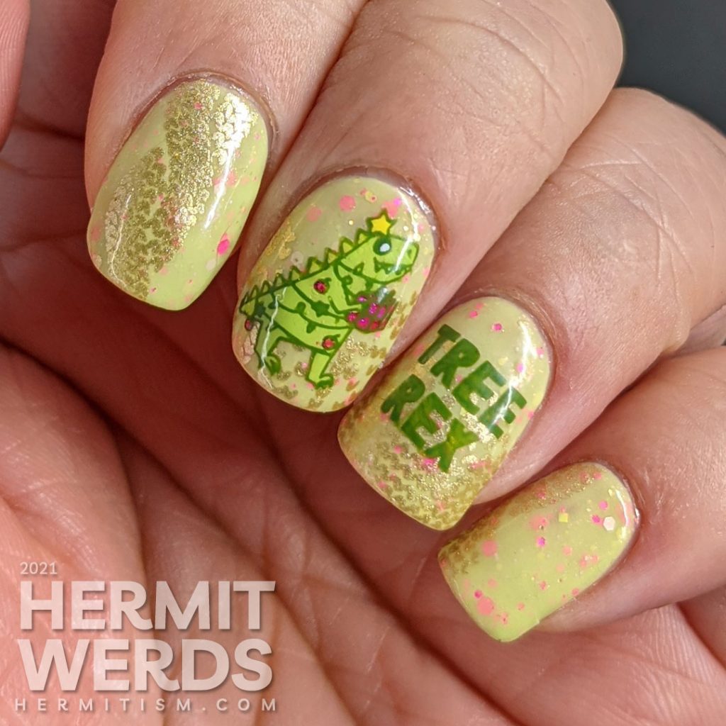 Christmas nail art with stamping decals of Tree Rex & dinosaurs in cozy sweaters in neon pink, green, yellow, and white on a green crelly.