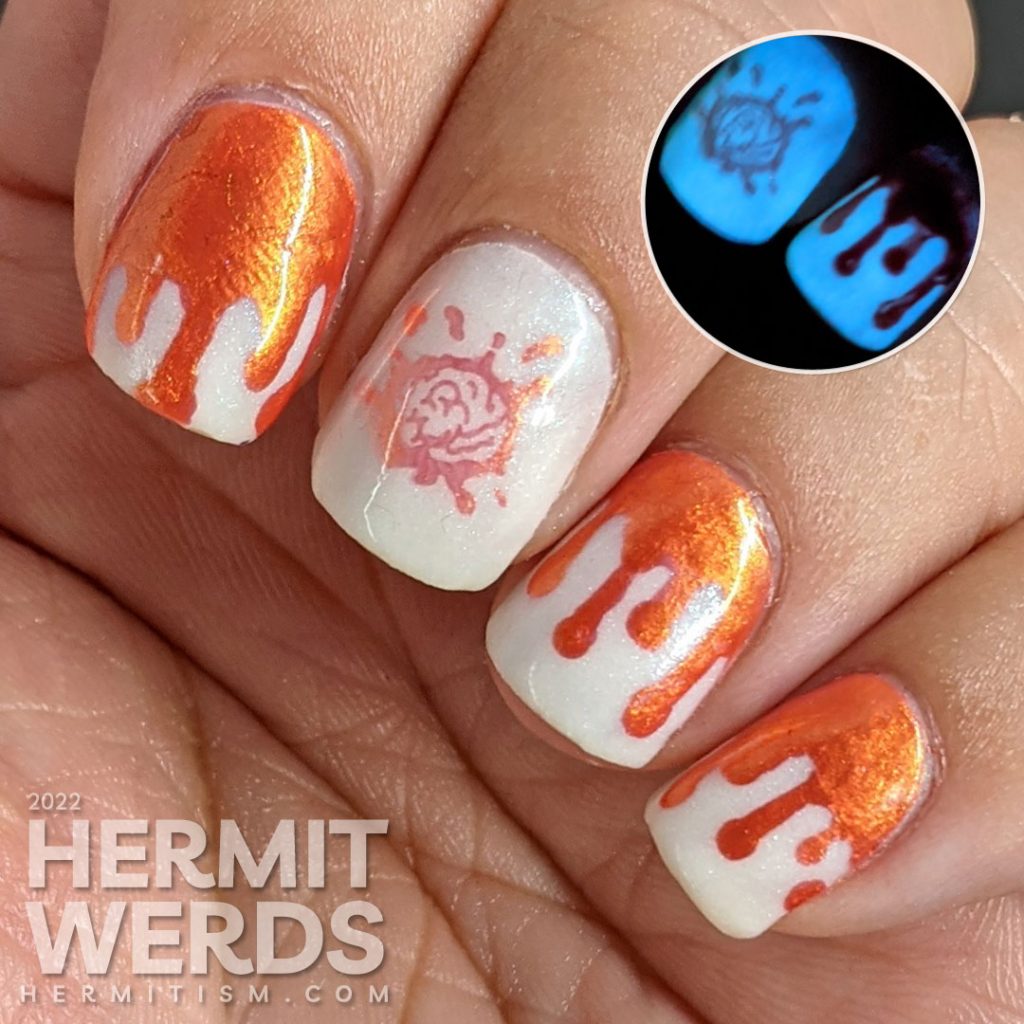 Orange and white bloody french tip drip nail art on a glow in the dark base with a bloody brain stamping decal.
