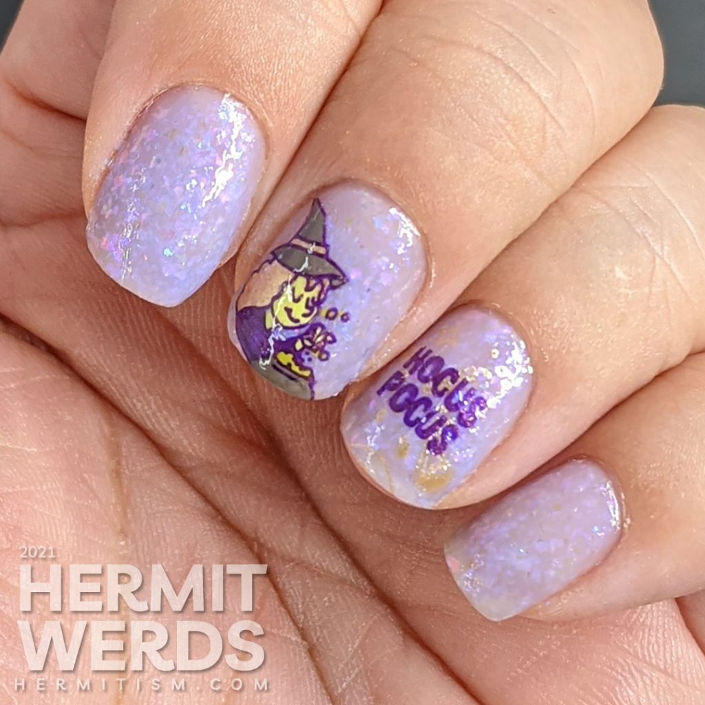 First version of witchy nail art with just words and a little brewing witch.