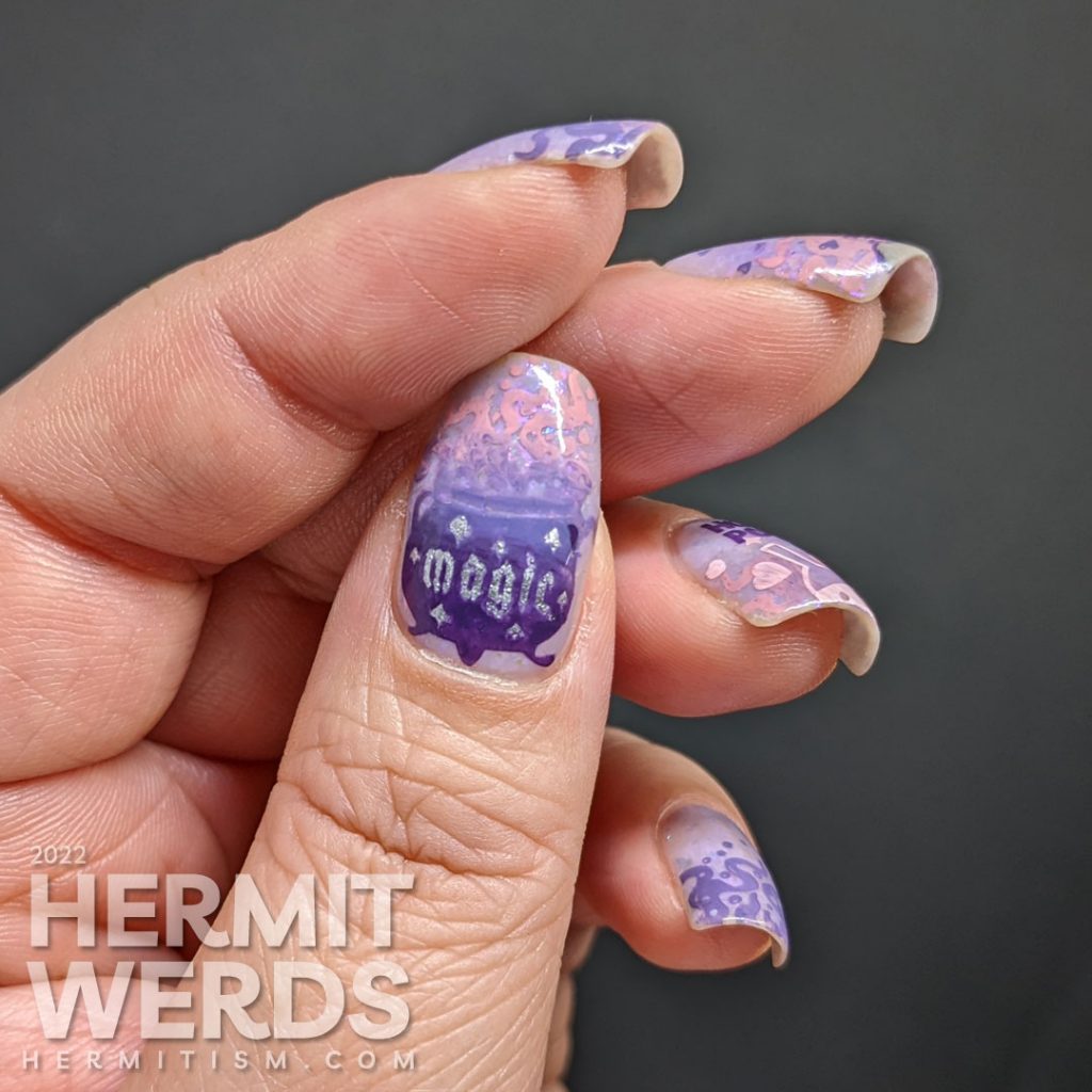 A witchy Valentine's Day nail art w/stamping decals of a cute witch brewing up a love potion with lots of hearts on a lilac flakie polish.
