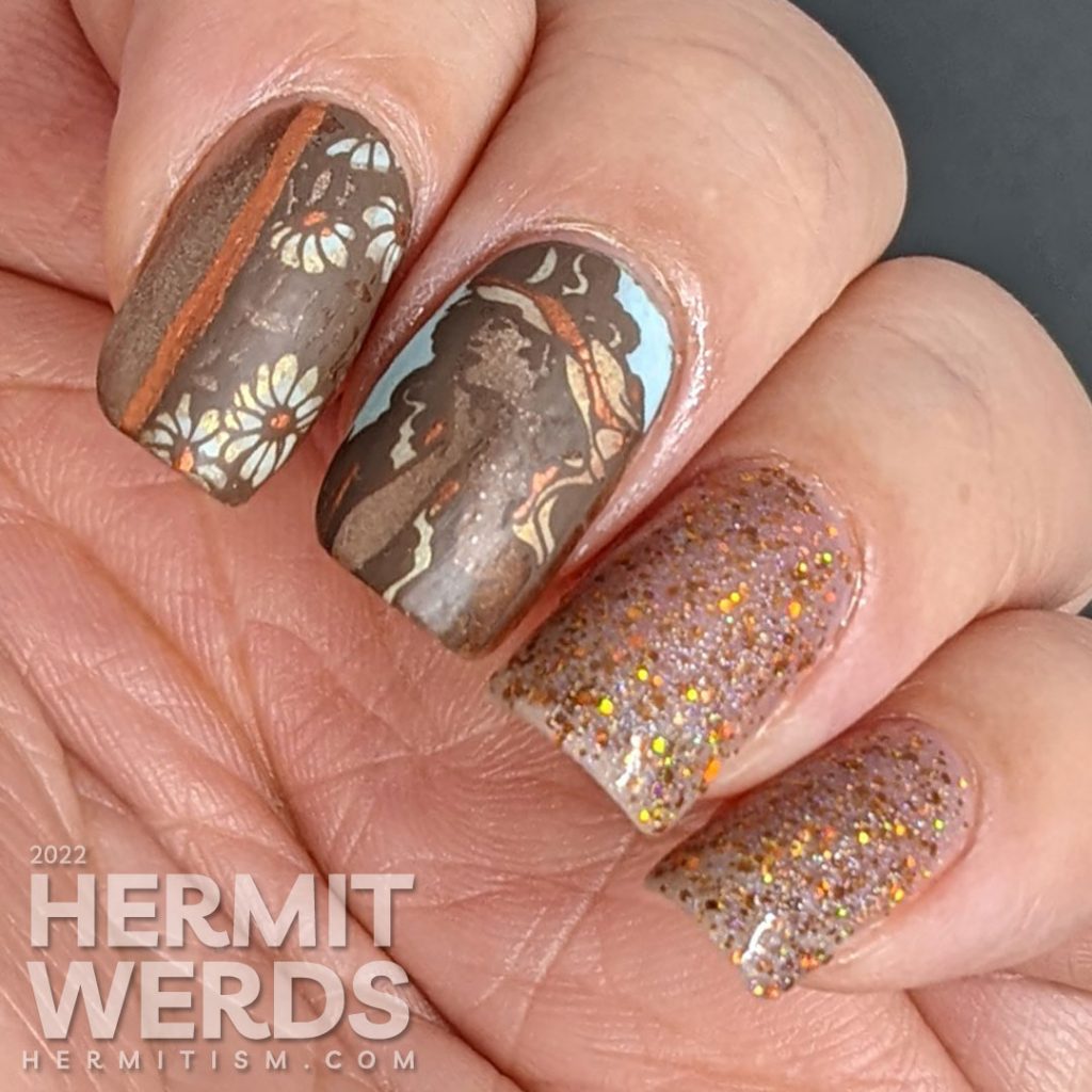 A soft, golden brown art nouveau nail art with a beautiful art nouveau woman, florals, and accompanying sparkly accent nails.