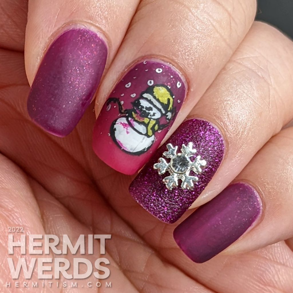 Beautiful berry mani with a textured accent nail + silver snowflake nail charm offset by stamping decals of scary bloody snowmen.