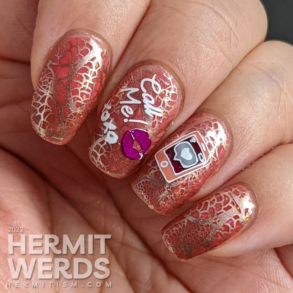 A Valentine's Day nail art with rosegold lace stamping on a pink thermal jelly with reverse stamping decals saying "Call me! XOXO".