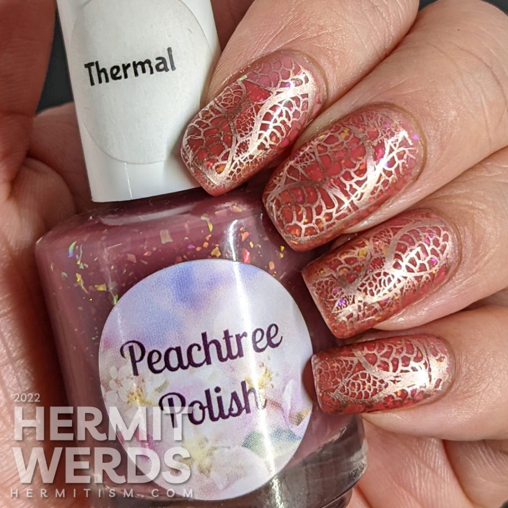 A Valentine's Day nail art with rosegold lace stamping on a pink thermal jelly with reverse stamping decals saying "Call me! XOXO".